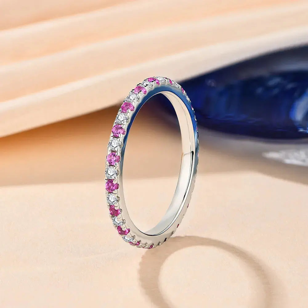 Gold or Silver 1.5mm Moissanite Eternity Ring with Pink Sapphire .5ctw